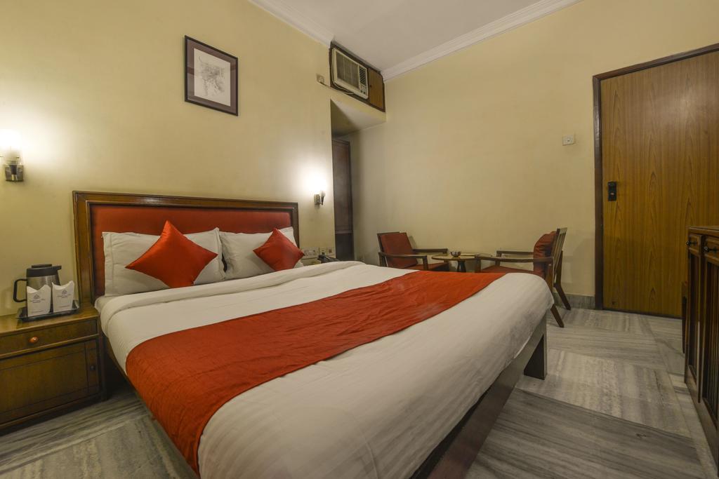 Camac Plaza Hotel Calcutta Værelse billede